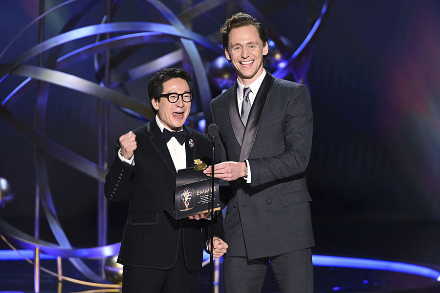 Tom Hiddleston and Ke Huy Quan of Loki present an award at the 75th Emmy Awards 
