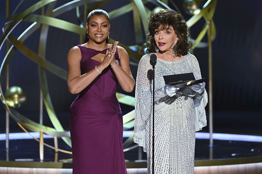 Taraji P. Henson and Dame Joan Collins present an award at the 75th Emmy Awards