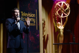 Scott Aukerman presents an award at the 36th College Television Awards at the Skirball Cultural Center in Los Angeles, California, April 23, 2015.