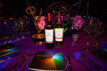 66th Primetime Emmys Governors Ball table setting, featuring official wine selections from sponsor Beaulieu Vineyard.