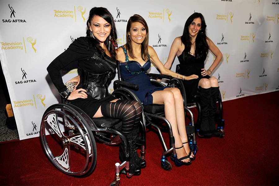 Auti Angel, Angela Rockwood, and Mia Schaikewitz arrive at Dynamic and Diverse: A 66th Emmy Awards Celebration of Diversity at the Television Academy in North Hollywood, California.