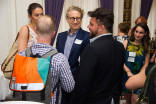 Bernie Telsey chats with colleagues at Networking Night Out NYC! at the St. Regis Hotel in New York City, June 12, 2015.