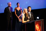 Bettina Shore and Nikolas Kuo accept an award at the 68th Los Angeles Area Emmys, July 23, 2016, at the Saban Media Center, North Hollywood, California.