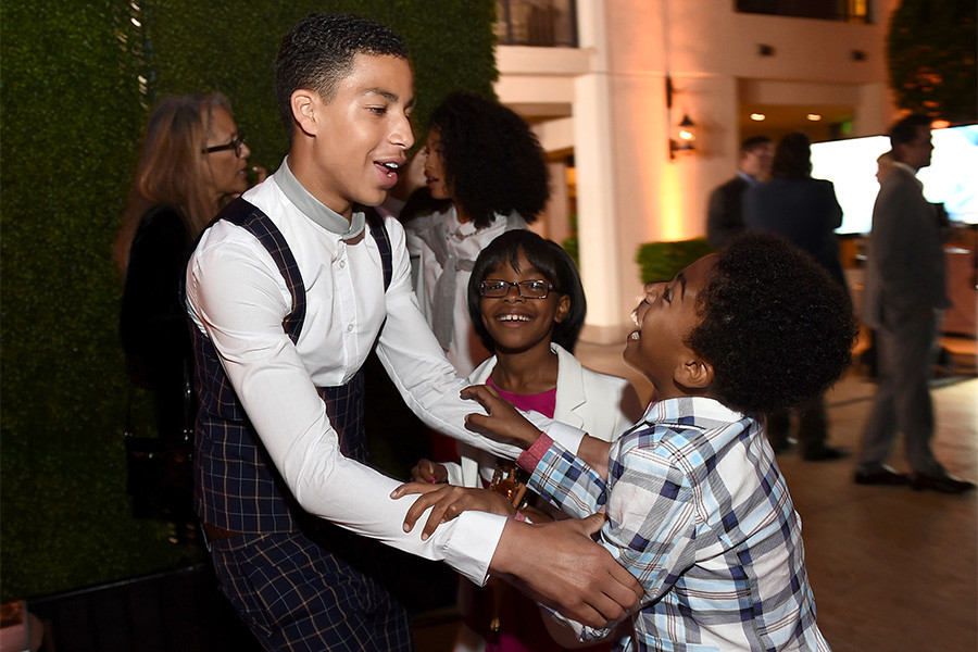 Marcus Scribner, Marsai Martin, and Miles Brown of black-ish wait to go onstage at the awards presentation at the Eighth Annual Television Academy Honors, May 27 at the Montage Beverly Hills.