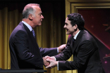 Bob Cook (L), chairman of the Television Academy Foundation, greets actor Robin Lord Taylor at the 36th College Television Awards at the Skirball Cultural Center in Los Angeles, California, April 23, 2015.