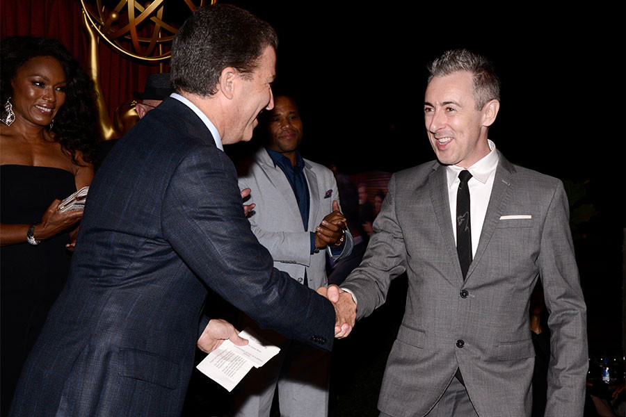 Television Academy chairman and CEO Bruce Rosenblum and Alan Cumming at the Performers Nominee Reception September 19, 2015, at the Pacific Design Center in Los Angeles, California.