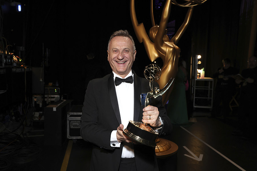 Italo Di Pinto of The White Lotus backstage at the 75th Creative Arts Emmy Awards 