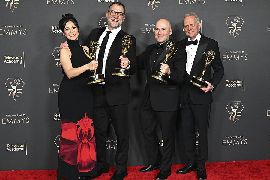 The Sound Mixing Team from Daisy Jones and The Six backstage at the 75th Creative Arts Emmy Awards