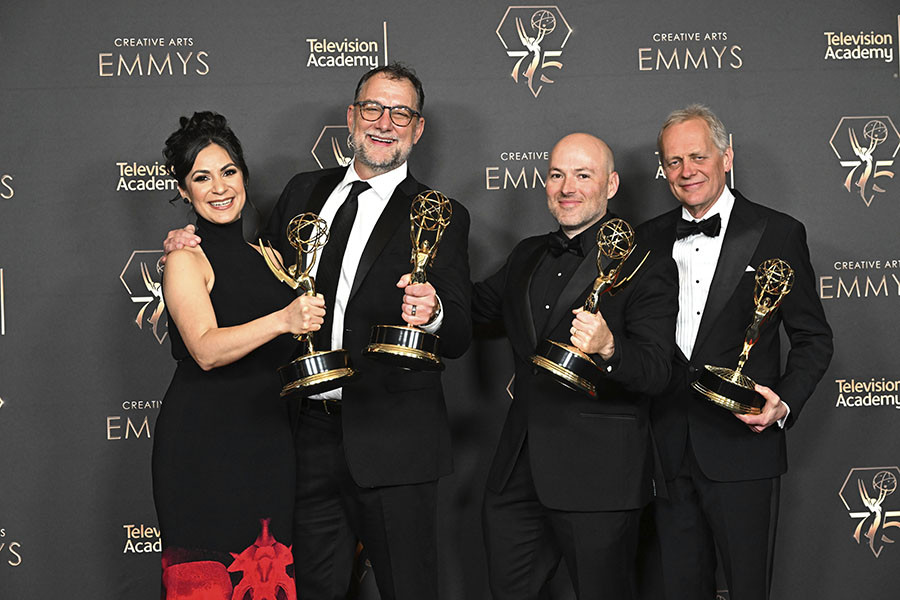 The sound mixing team from Daisy Jones and The Six backstage at the 75th Creative Arts Emmy Awards 