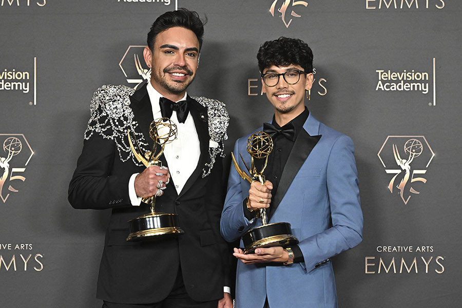 Abdiel "Gloria" Urcullu and Tyler Funicelli, the hairstyling team for We're Here: St. George, Utah backstage at the 75th Creative Arts Emmy Awards