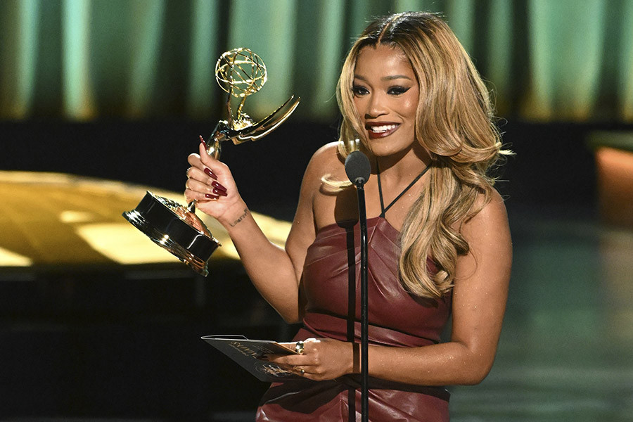 Keke Palmer accepts the award for Outstanding Host for a Game Show for Password at the 75th Creative Arts Emmy Awards