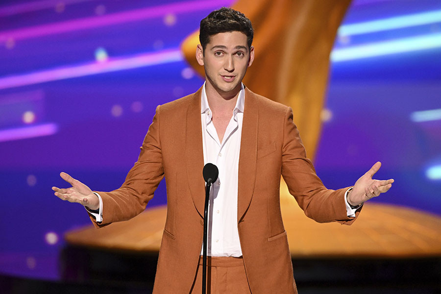 Matt Friend presents onstage at the 76th Creative Arts Emmy Awards