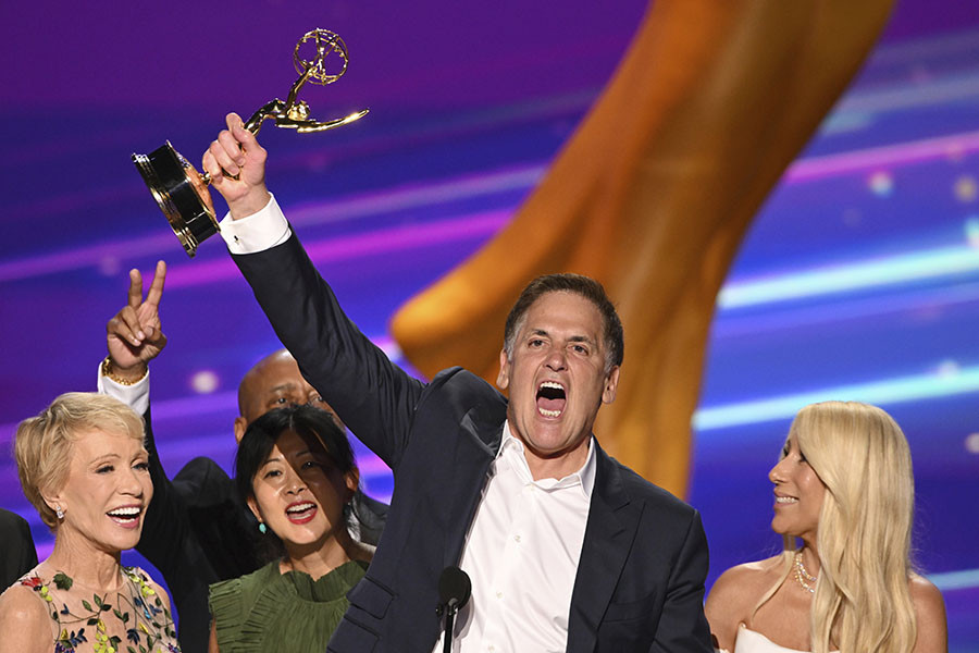Mark Cuban and the cast of Shark Tank accept the award for Outstanding Structured Reality Program at the 76th Creative Arts Emmy Awards