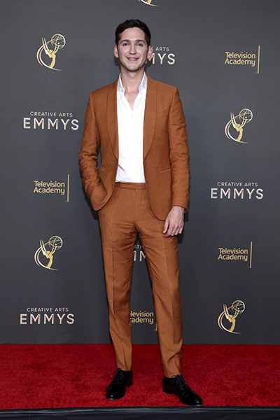 Matt Friend poses backstage at the 76th Creative Arts Emmy Awards