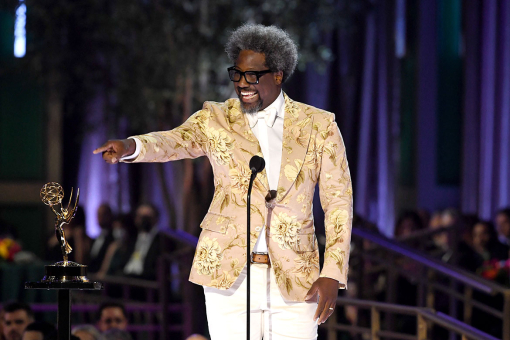 W. Kamau Bell on stage at the 2022 Creative Arts Emmy Awards.