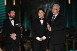The team from The Voice accept the award for Outstanding Lighting Design/Lighting Direction for a Variety Series at the 2022 Creative Arts Emmy Awards.