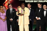 The team from Last Week Tonight with John Oliver accepts the award for Outstanding Writing for a Variety Series at the 2022 Creative Arts Emmy Awards.