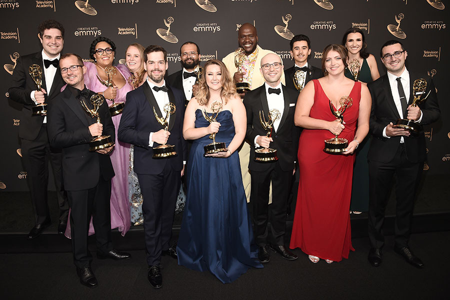 The writing team from Last Week Tonight With John Oliver backstage at the 2022 Creative Arts Emmy Awards.