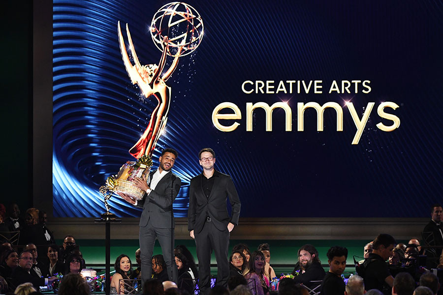 Ryan Broussard and James Caverly on stage at the 2022 Creative Arts Emmy Awards.
