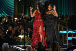 Jeanette Branch and Niecy Nash of Claws present the award for Outstanding Stunt Coordination for a Drama Series at the 2022 Creative Arts Emmy Awards.