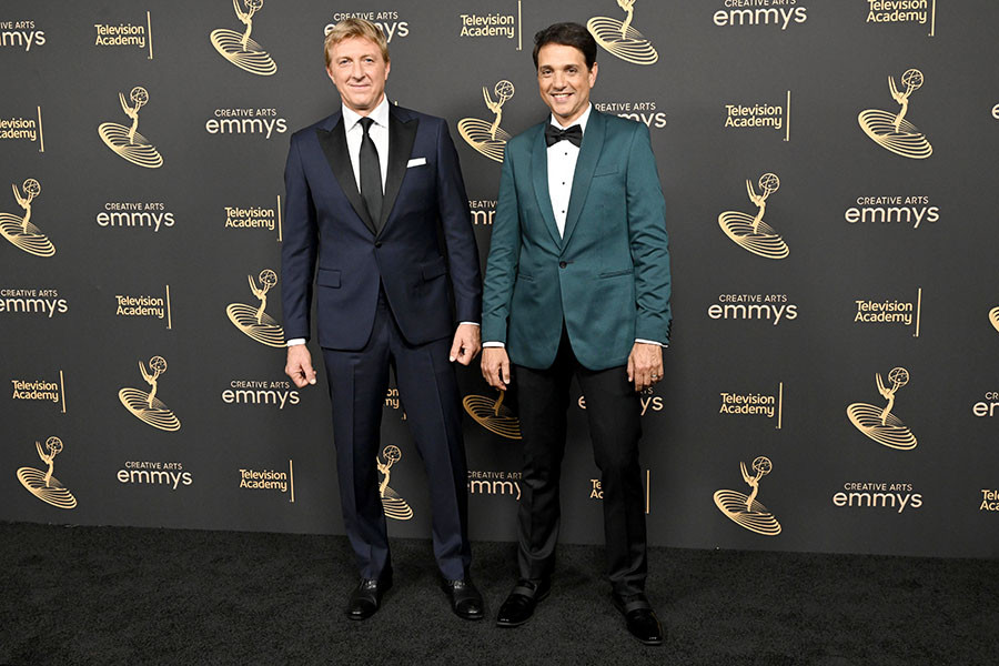 William Zabka and Ralph Macchio of Cobra Kai backstage at the 2022 Creative Arts Emmy Awards.