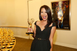 KTLA&#039;s Cher Calvin celebrates backstage at the 66th Los Angeles Area Emmy Awards.