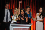 Cher Calvin and team accept an award at the 66th Los Angeles Area Emmys.
