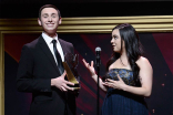 Christian Heilman and Rachel White accept an award at the 36th College Television Awards at the Skirball Cultural Center in Los Angeles, California, April 23, 2015.