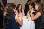 Dina Muradian, Tiffany Tulba, and Jenna Martone chat with friends at the New York Networking Night Out, November 13, 2015 at the St. Regis in New York City.
