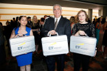 Edith Varela, Andy Sale, and Agnes Janiczek of Ernst and Young deliver the all-important envelopes at the 67th Los Angeles Area Emmy Awards cocktail party July 25, 2015, at the Skirball Cultural Center in Los Angeles, California.