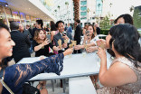 Peer group members post photos of the food at the IMPG Celebration of Excellence, September 7, 2016 at the Saban Media Center, North Hollywood, California.