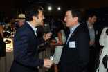 Television Academy governor Fred Savage with Television Academy chairman and CEO Bruce Rosenblum at the Directors nominee reception September 16, 2015, at the Directors Guild of America in Los Angeles, California.