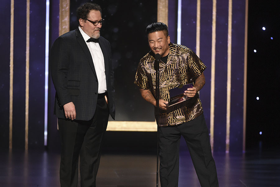 Jon Farvreau and Roy Choi present an award at the 2019 Creative Arts Emmy Awards.