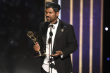 Hector Pocasangre accepts an award at the 2019 Creative Arts Emmys. 