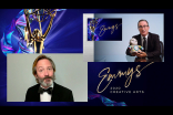 Thomas Lennon presents the award for Outstanding Writing For A Variety Series to John Oliver for Last Week Tonight With John Oliver on Night Two of the Creative Arts Emmys.