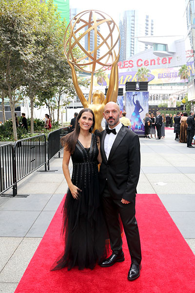 Aurora Amat and Gonzalo Amat arrive on the red carpet at the Creative Arts Emmys. 