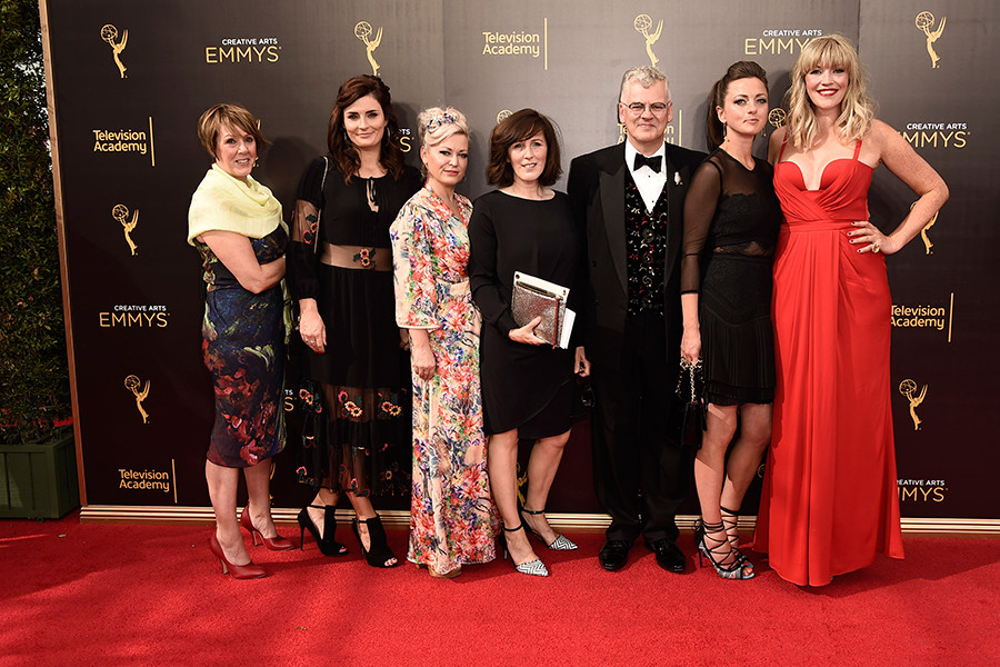 Costume hair and makeup team of Downton Abbey on the red carpet the 2016 Creative Arts Emmys.