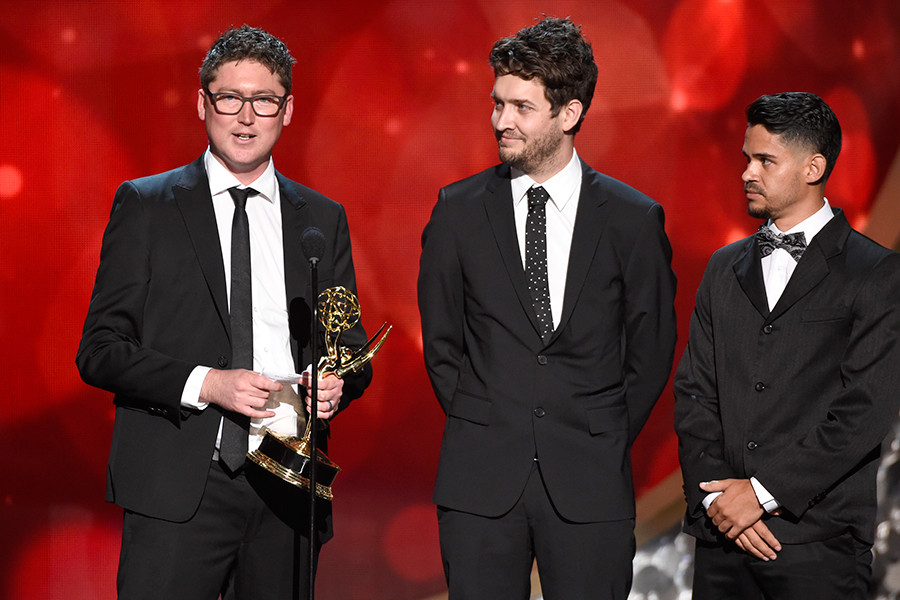 The team from The Man in the High Castle accepts their award at the 2016 Creative Arts Emmys. 