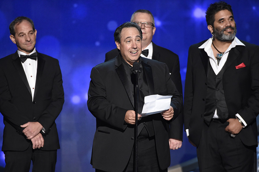 The sound mixing team from Mozart in the Jungle accept an award at the 2016 Creative Arts Emmys. 
