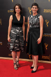 Laura Ricciardi and Moira Demos on the red carpet at the 2016 Creative Arts Emmys.