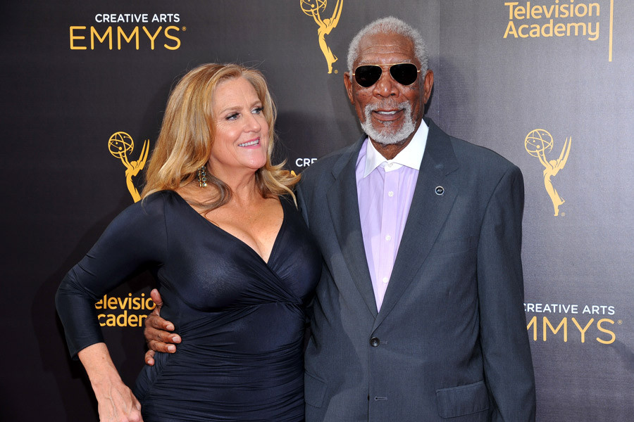 Lori McCreary and Morgan Freeman on the red carpet at the 2016 Creative Arts Emmys.