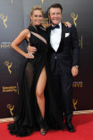 Kym Johnson and Robert Herjavec on the red carpet at the 2016 Creative Arts Emmys.