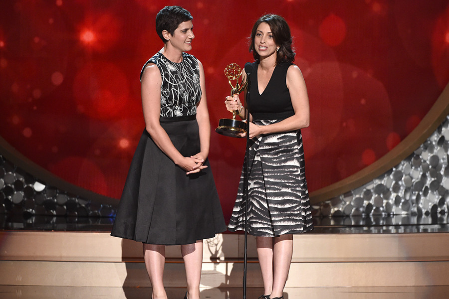 Laura Ricciardi and Moira Demos accept their award at the 2016 Creative Arts Emmys.