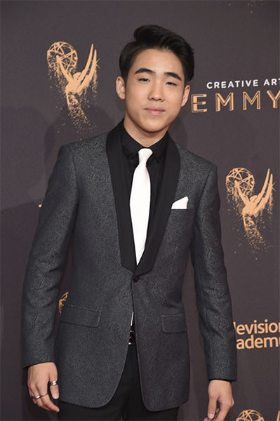 Lance Lim on the red carpet at the 2017 Creative Arts Emmys.