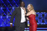 Brian Tyree Henry and Wendi McLendon-Covey on stage at the 2017 Creative Arts Emmys.