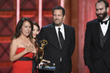 The team from Stranger Things accepts their award at the 2017 Creative Arts Emmys. 