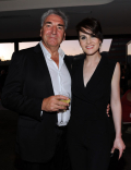 Jim Carter (l) and Michelle Dockery (r) of Downton Abbey attend the Performers nominee reception.