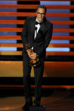 True Detective director Cary Joji Fukunaga accepts an award at the 66th Emmy Awards.