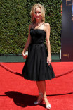 Beth Littleford of Dog with a Blog arrives for the 2014 Primetime Creative Arts Emmys.