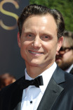 Tony Goldwyn arrives for the 2014 Primetime Creative Arts Emmys.